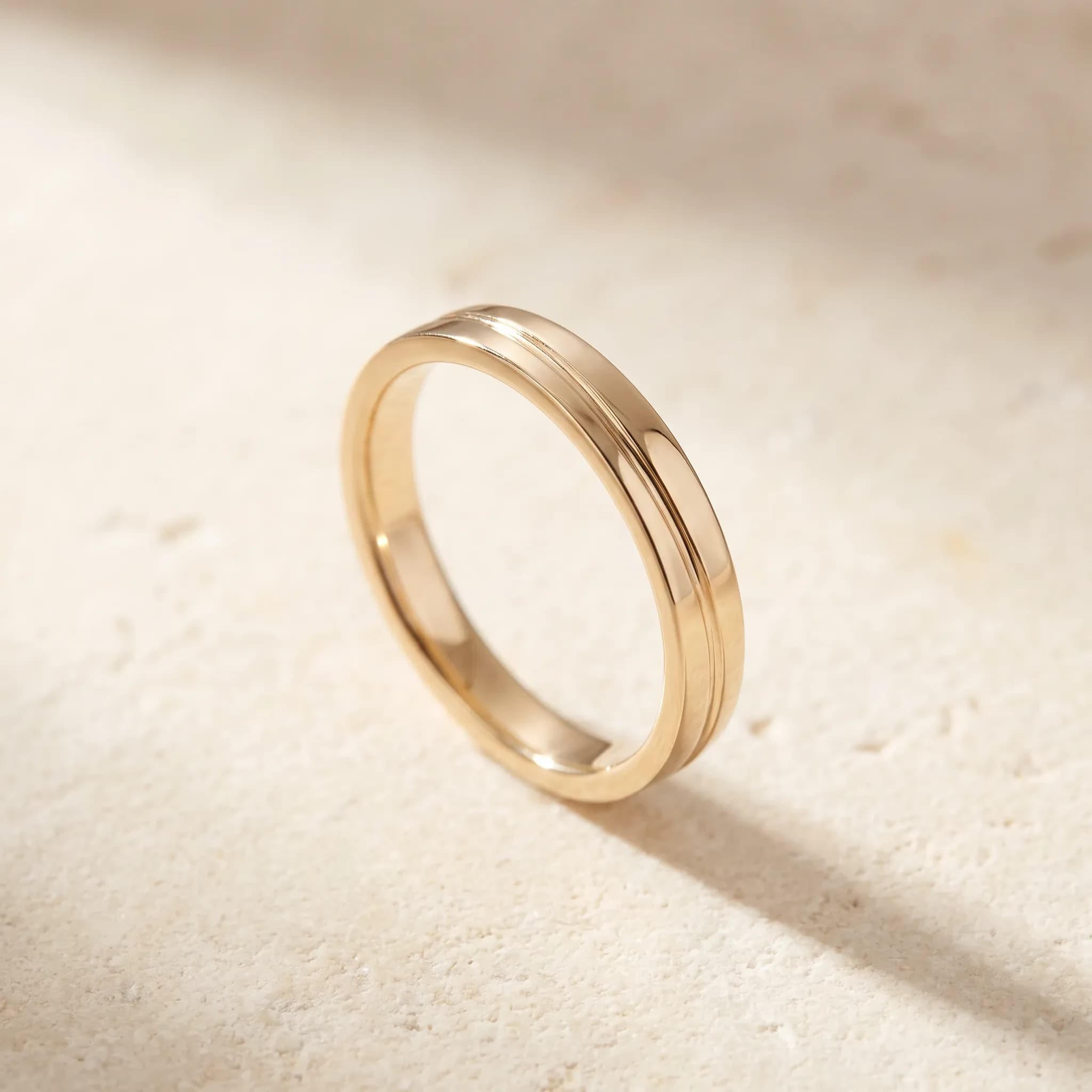 Quiet Line Band, an illustrative yellow-gold tone jewelry concept