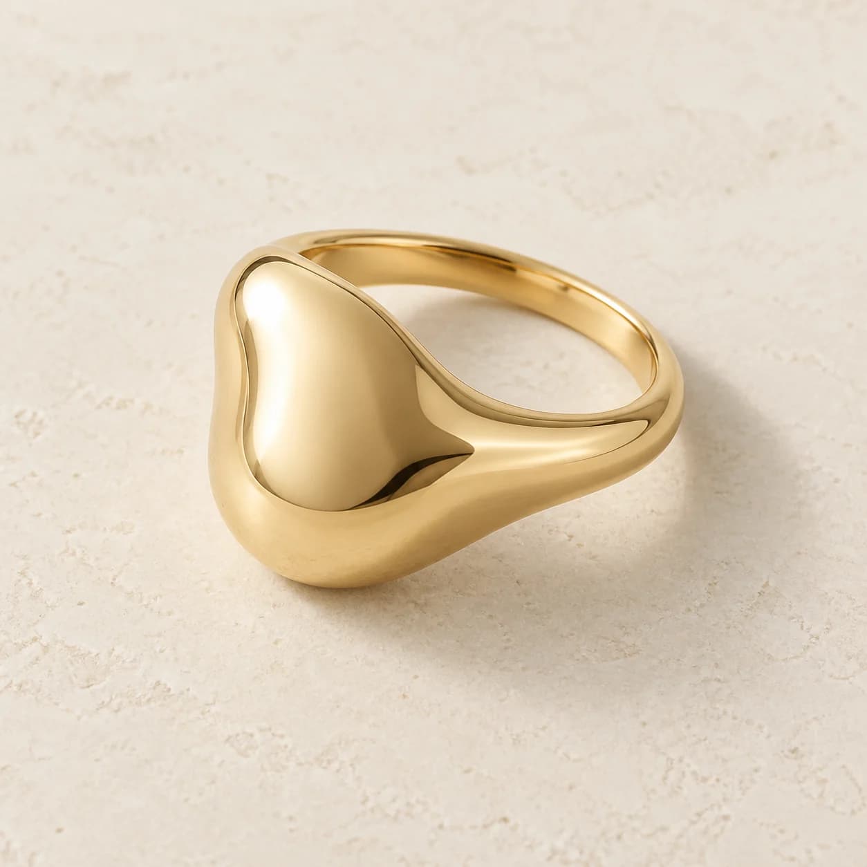 Original Sculpted Ring concept on a pale background